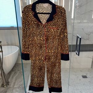 Leopard Print Pajama Set with Black Accents and Red Trim